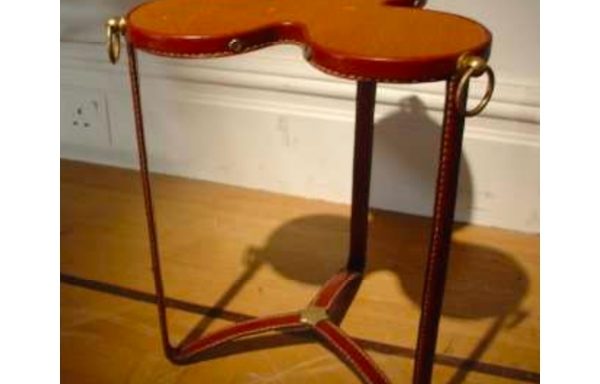 A leather side table attributed Jacques Adnet / France / circa 1960 