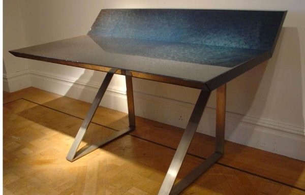 A resin and steel desk. Italy. Circa 1970