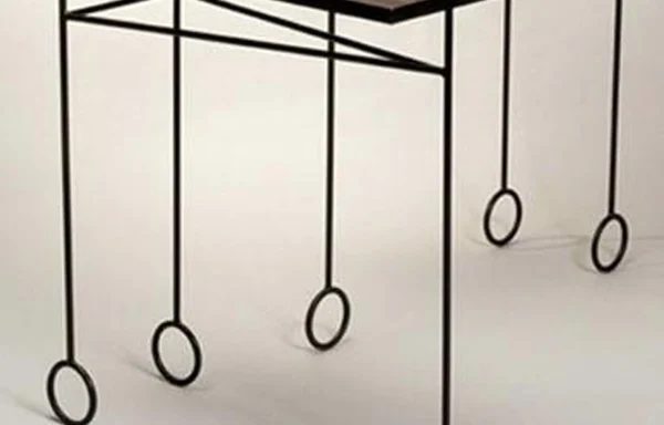 Metal ebony and straw inlayed console tables – Jean Royere
